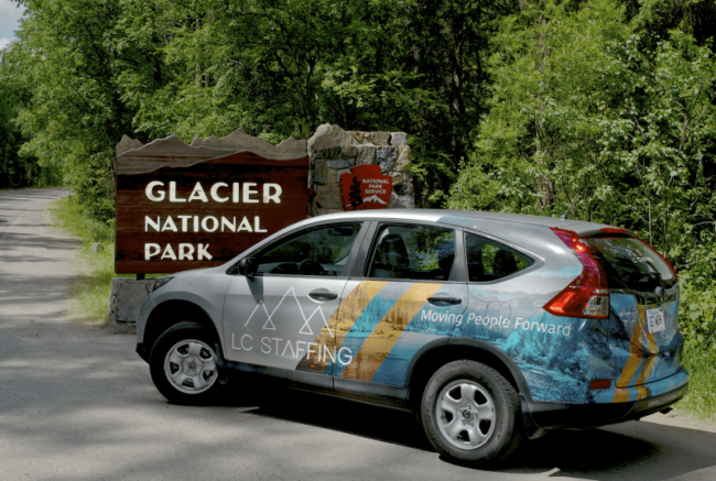 LC Staffing Logo car in Glacier National Park