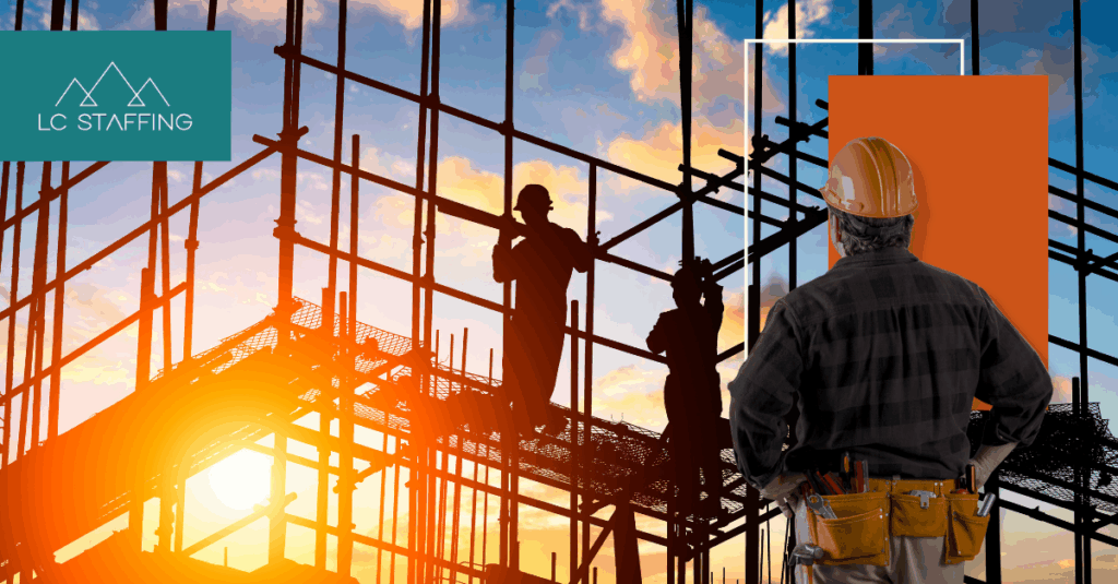 A skilled construction worker in a hard hat and tool belt surveys a scaffolding structure at sunset, illustrating the challenge employers face when trying to attract skilled workers in a competitive hiring market.