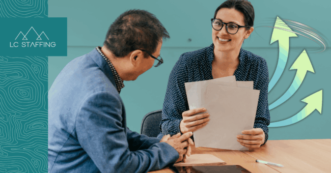 An employer and candidate meet face to face, illustrating how hiring speed shapes the outcome of competitive recruiting.