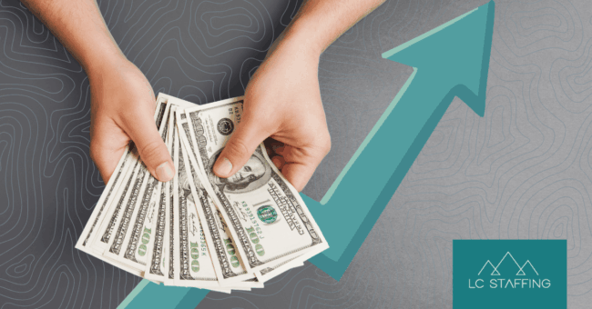Hands holding cash with an upward arrow, illustrating why competitive pay alone isn't enough to attract top talent.