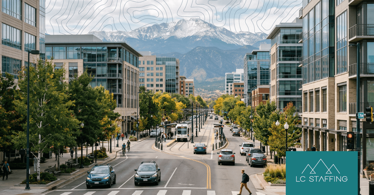 Labor market trends in the Mountain West shown through a busy Mountain West city street scene